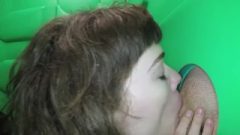 Brunette Gives A Blowjob At Glory Hole