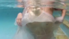 Underwater Tease With Stacked Brunette Charley Chase