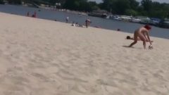Two Nudist sluts Plays Volleyball On A Beach Full Of People With No Clothes