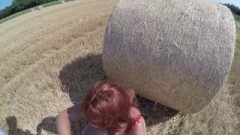 Slutty Redhead cougar Sucks In A Field With A Buttplug. Huge Facial Cumshot