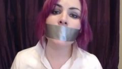 Purple Haired Whore Talking With Her Mouth Taped Shut